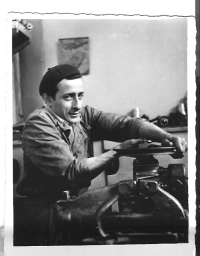 Dimitar Penchev at a machine in his workshop